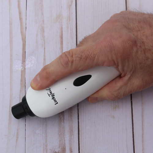 Lucky Tail Nail Grinder being held as if it were a knife Lucky Tail Nail Grinder being held as if it were a knife