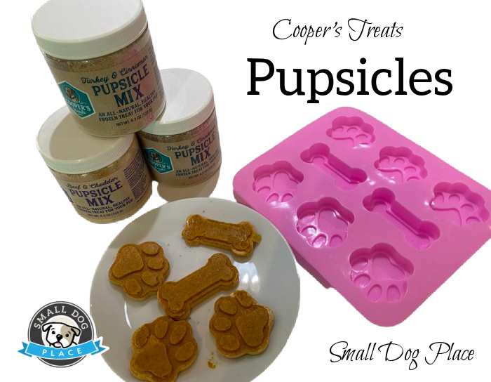 How to Make Cooper's Treats Pupsicles Shown are the finished pupsicles, mold, and jars of ingredients.