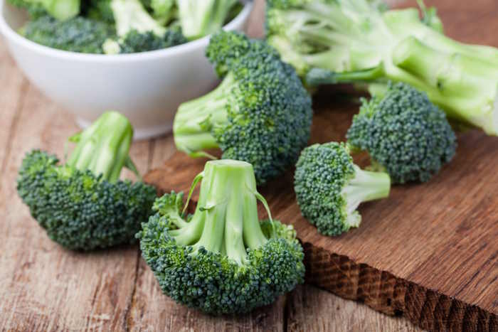 Fresh brocoli on wooden table