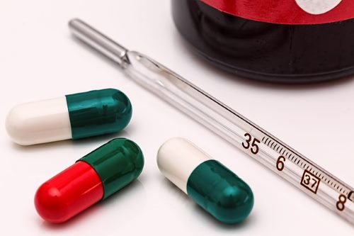 Respiratory Infections, a cause for Puppy Sneezing: Medicine and Thermometer Respiratory Problems: Medicine and Thermometer